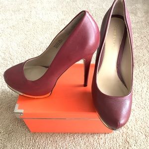 Burgundy heels and gold heels